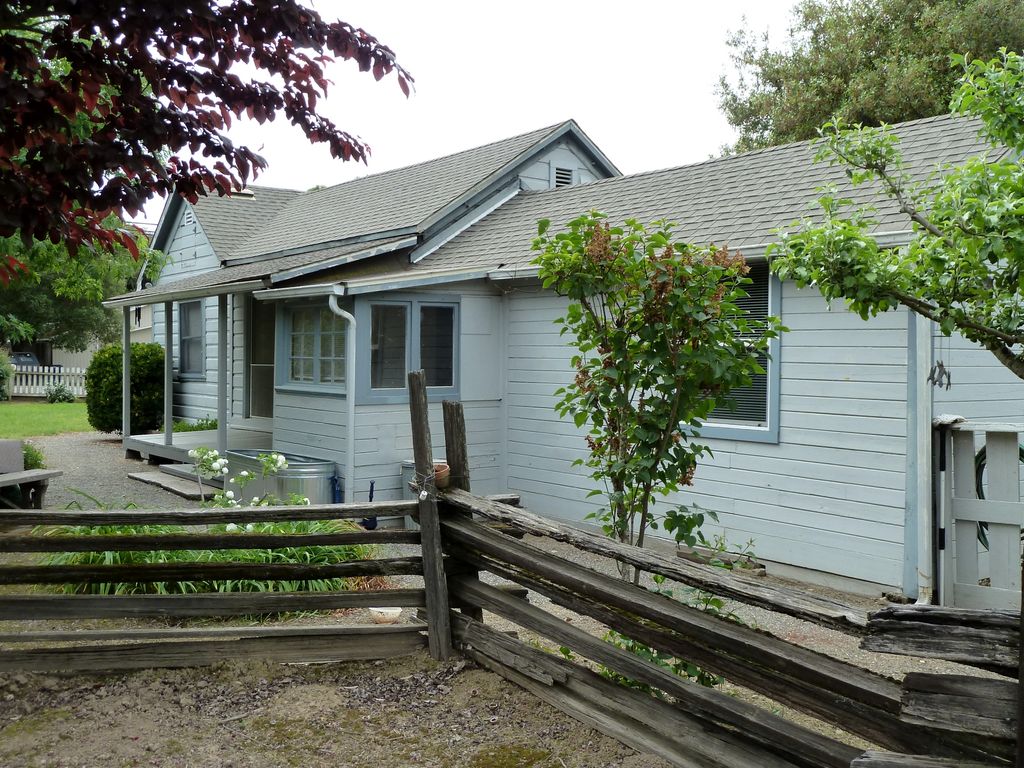 a blue farmhouse